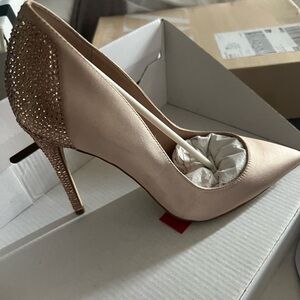 Nude satin heels with heel embellishments